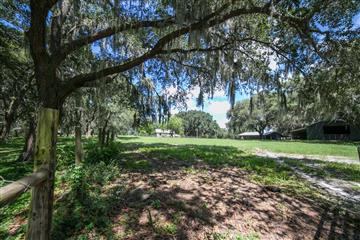 Barn, Utility Building and Stone Home of the  Crystal River Ranch for Sale